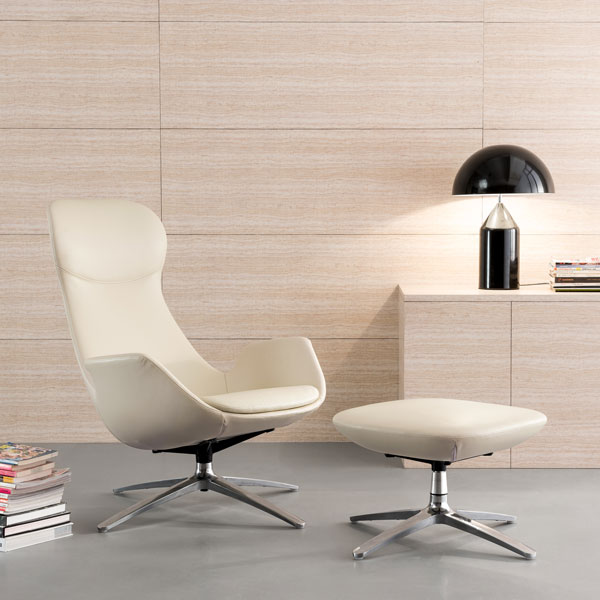 Contemporary cream-color leather chair with ottoman