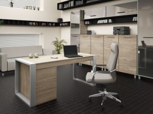 Two-tone gray leather executive chair at desk in office