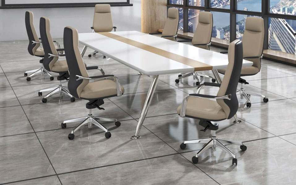Two-tone gray leather executive chairs around conference table