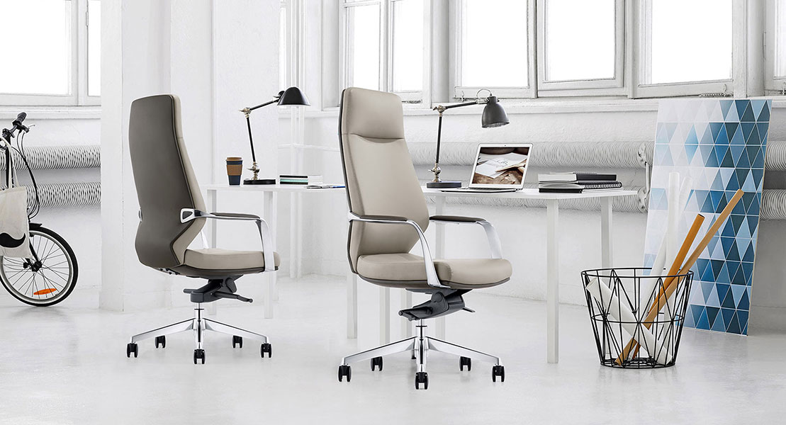 Two-tone gray leather chairs in contemporary office